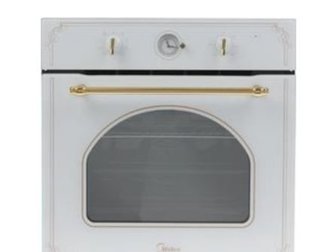 Продам электрический духовой шкаф Midea  модель 65DME40011, новый (в коробке),  Габариты ширина - 56, высота - 60, глубина - 57 см,  Объем духовки - 70 л,  Класс в Шахты